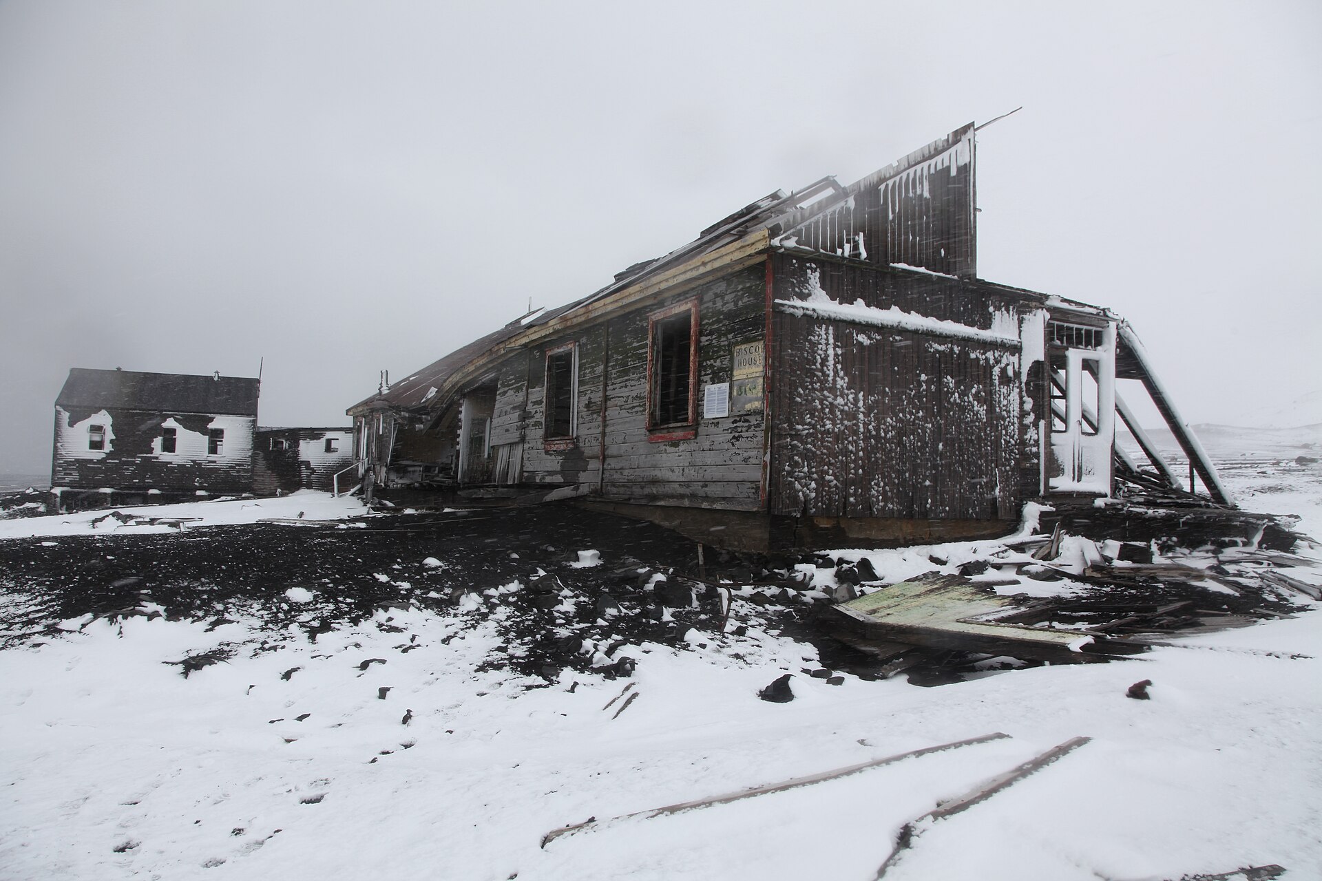 Snowbound remains of the British base at Whalers Bay, Deception Island