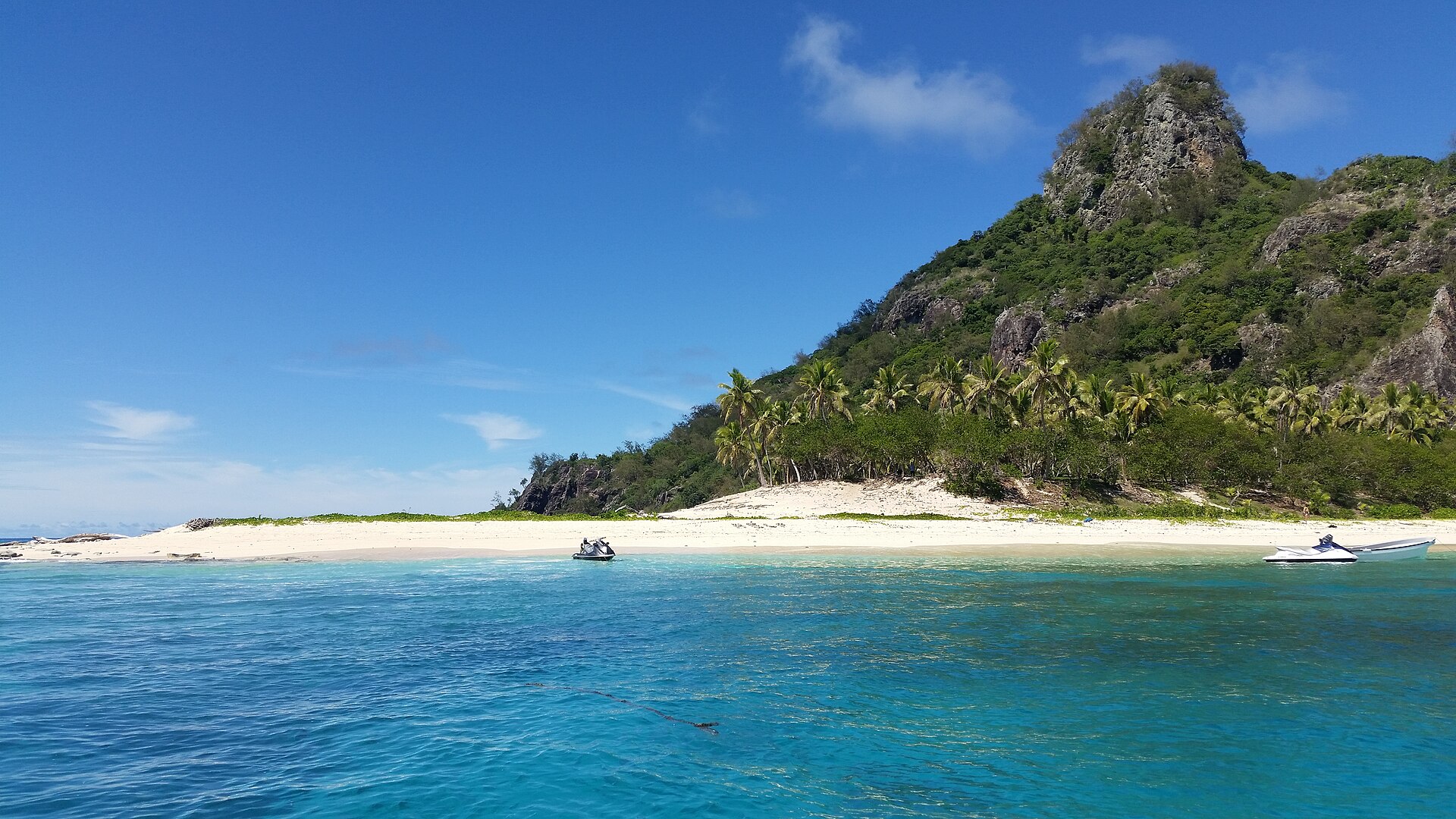 Peaked volcanic island and turquoise water at Monuriki, Mamanuca Islands, Fiji