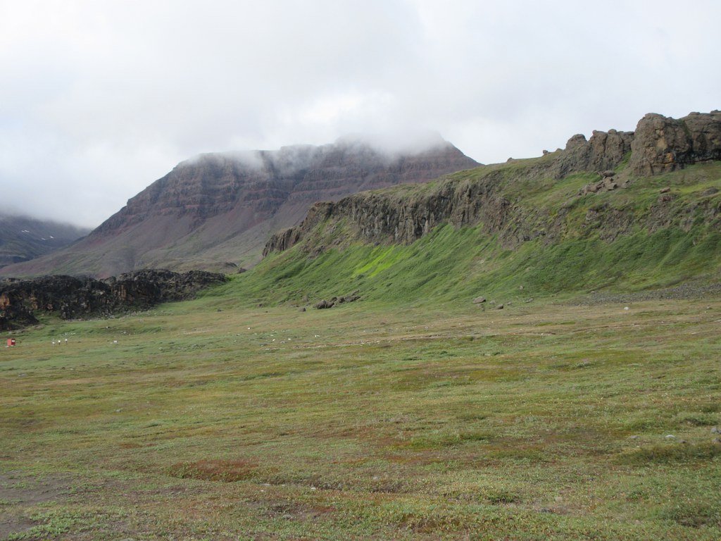Flat-topped basalt mountains of Disko Island above Qeqertarsuaq, Greenland