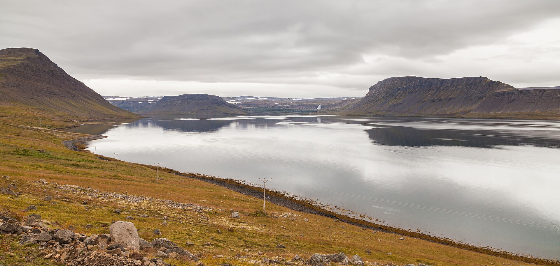 Still water and mountain walls of Arnarfjörður in the Westfjords