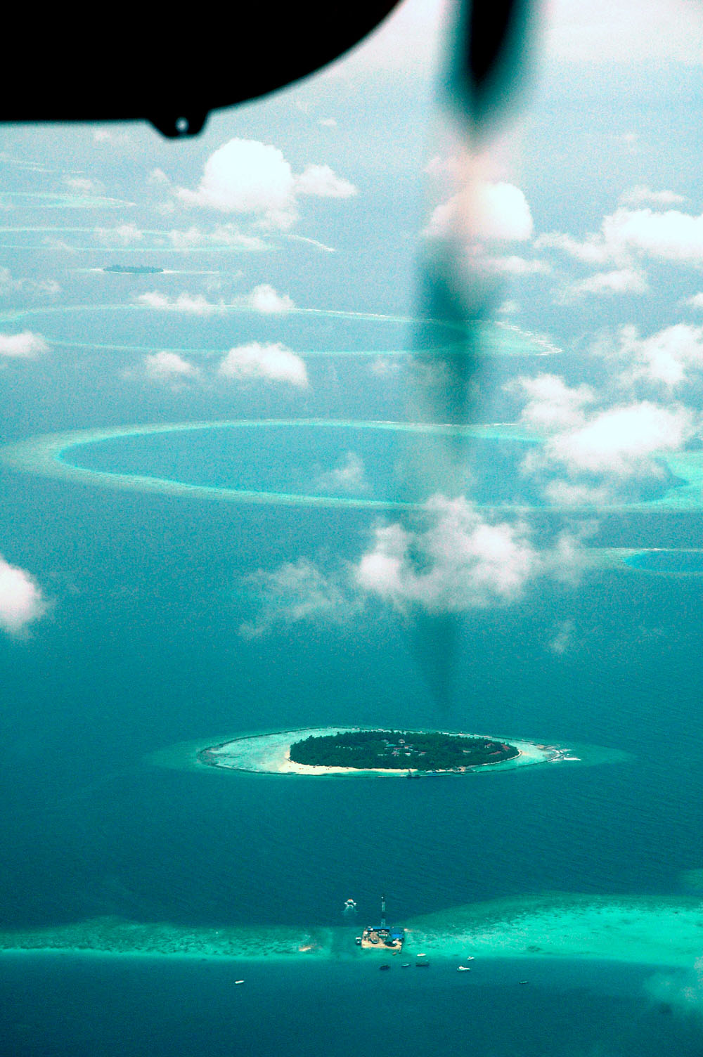 Aerial view of Ari Atoll's reef passes and islands