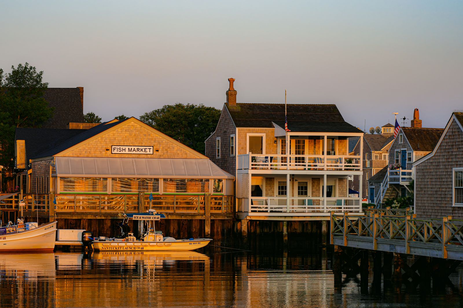Nantucket harbour and waterfront cottages at sunset