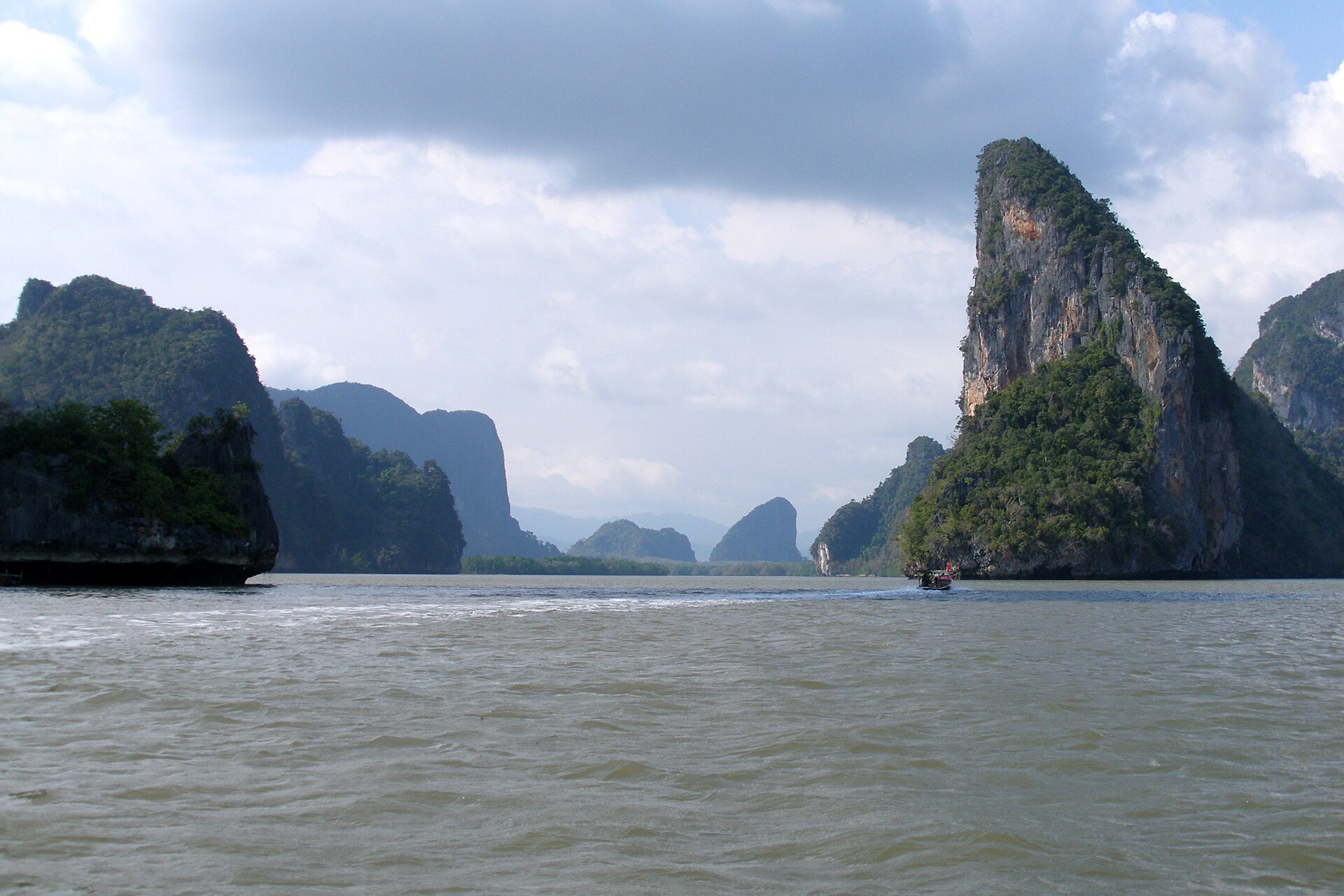 Limestone karst islands scattered across Phang Nga Bay