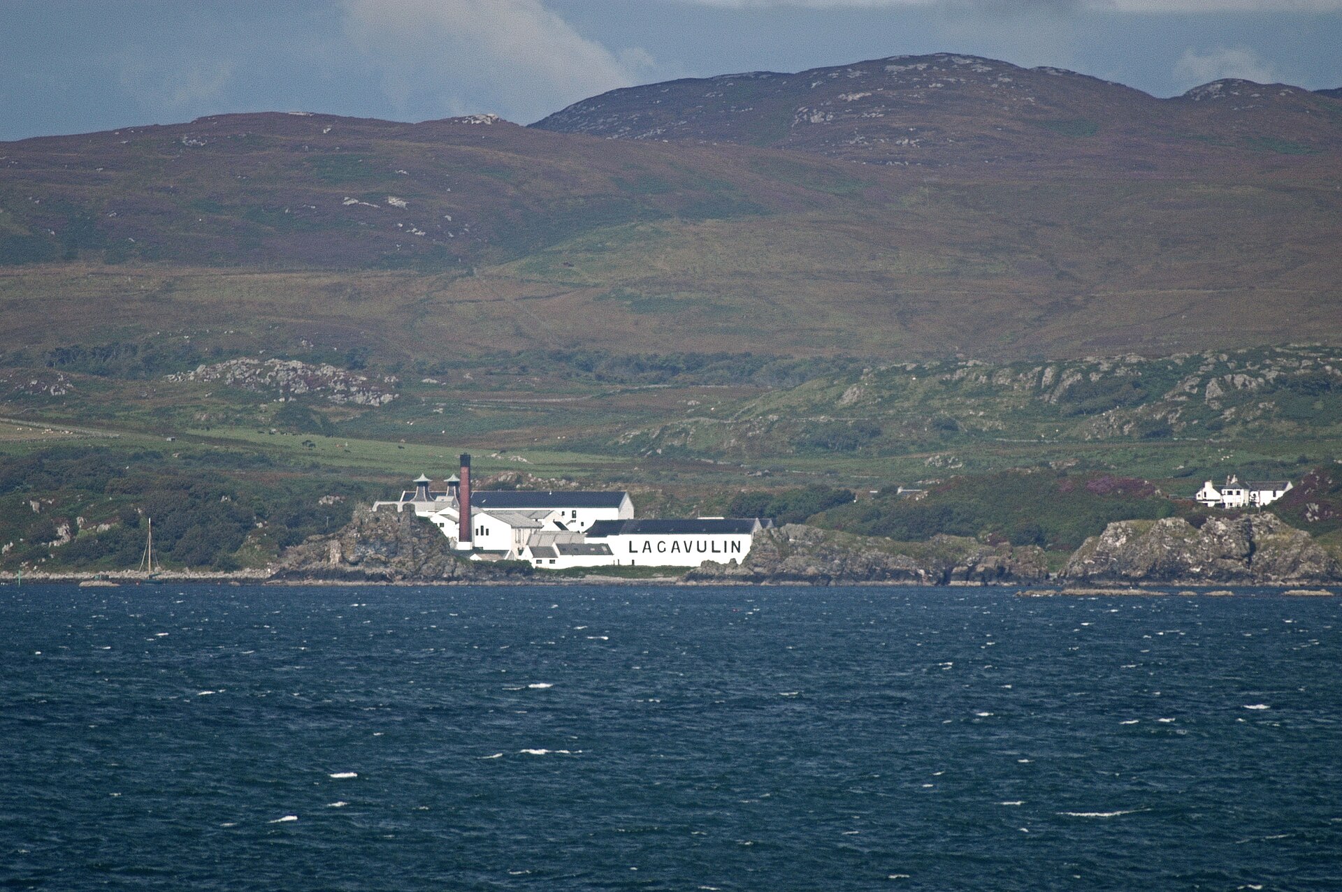 Lagavulin distillery on Islay's whisky coast, seen from the water
