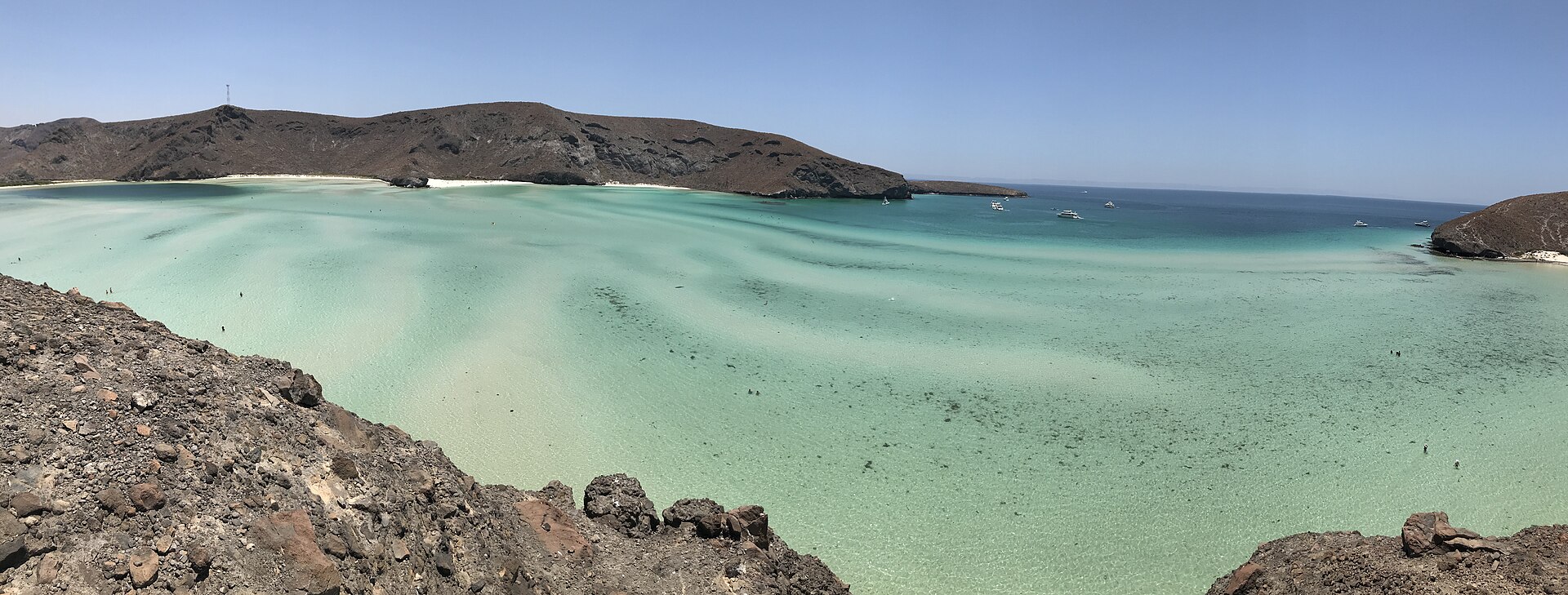 Balandra bay near La Paz — shallow turquoise water ringed by desert hills