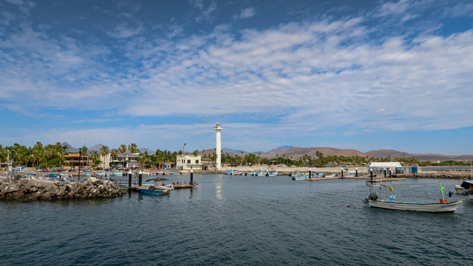Loreto's harbour and lighthouse on the Sea of Cortez, mountains behind