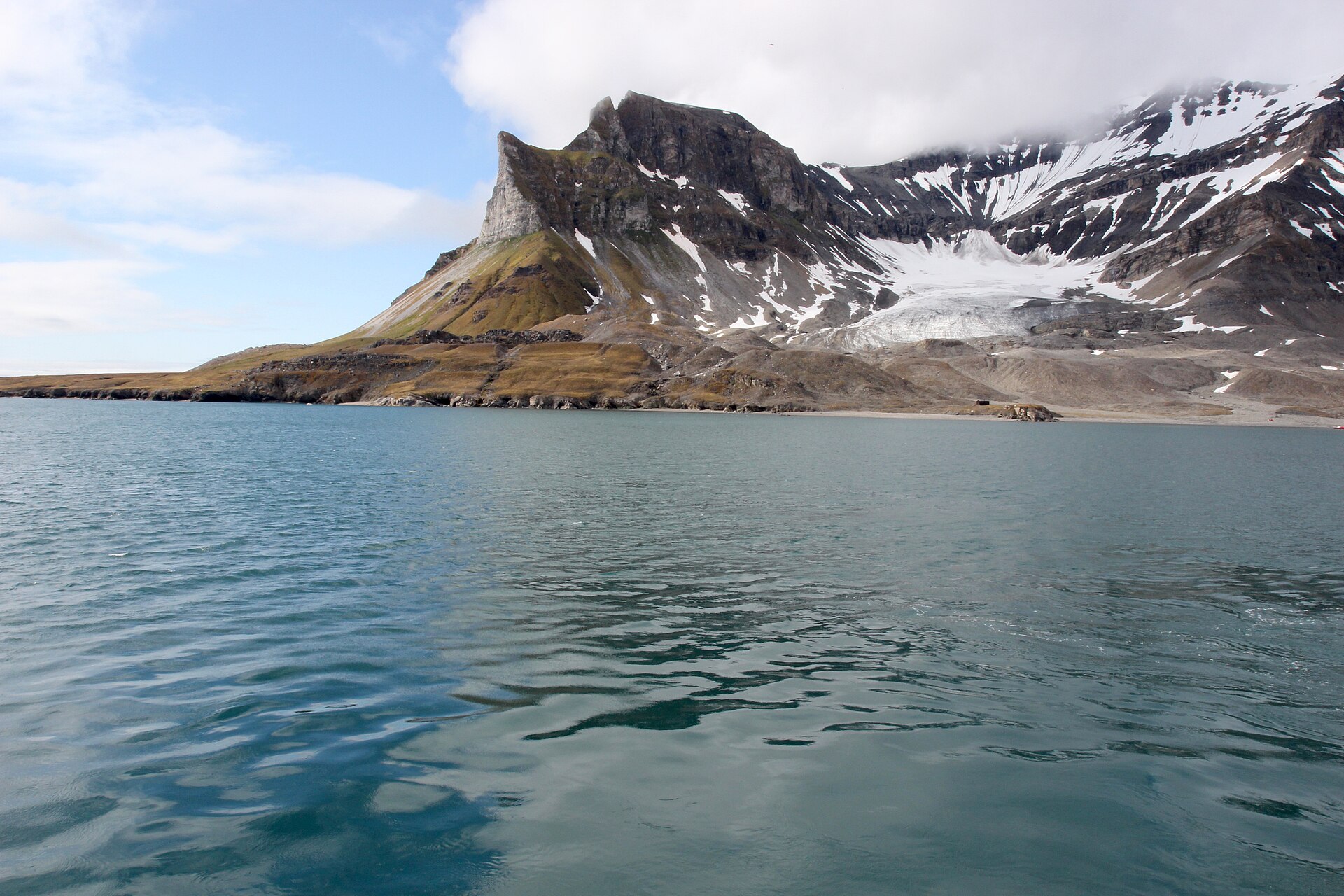 The Alkhornet bird cliffs and coastal tundra at the mouth of Isfjorden